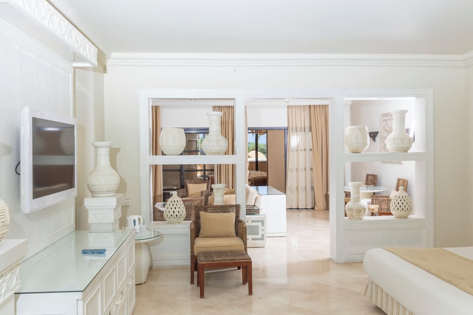 Suite with Private Plunge Pool | Iron/ironing board, bed sheets