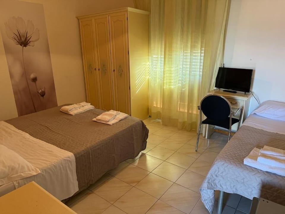 Classic Triple Room, Balcony, City View | Desk, free WiFi