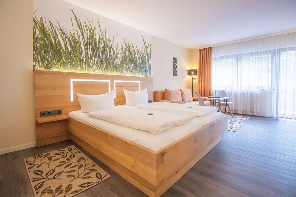 Deluxe Double Room, 1 Bedroom, Balcony, Garden View | In-room safe, blackout drapes, free WiFi, bed sheets