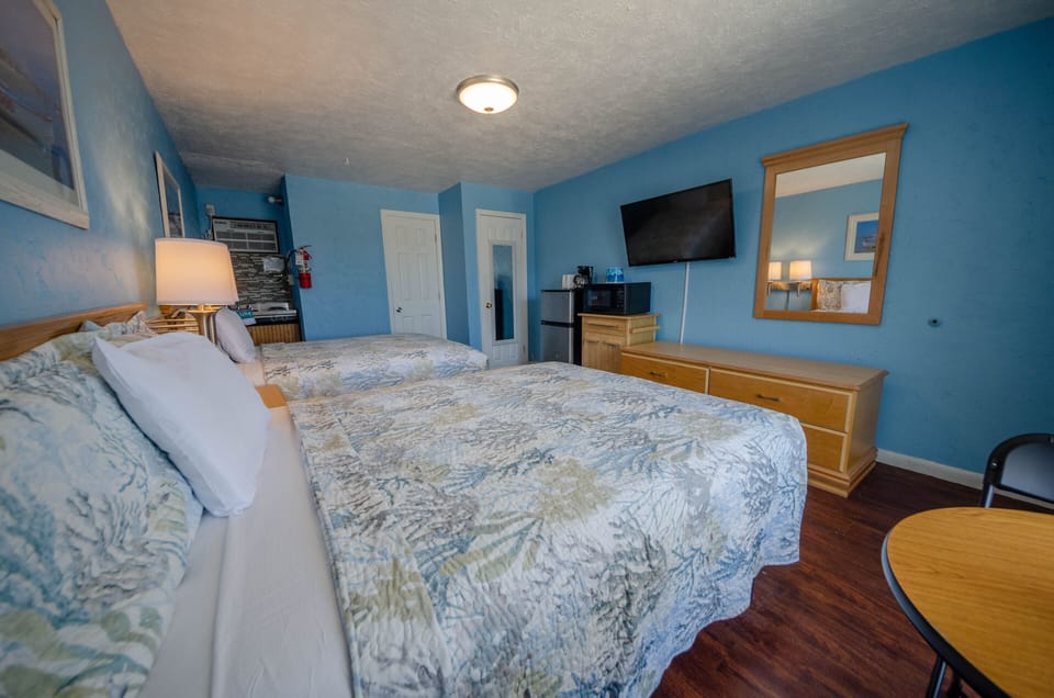 Family Room, Kitchenette | Free WiFi, bed sheets