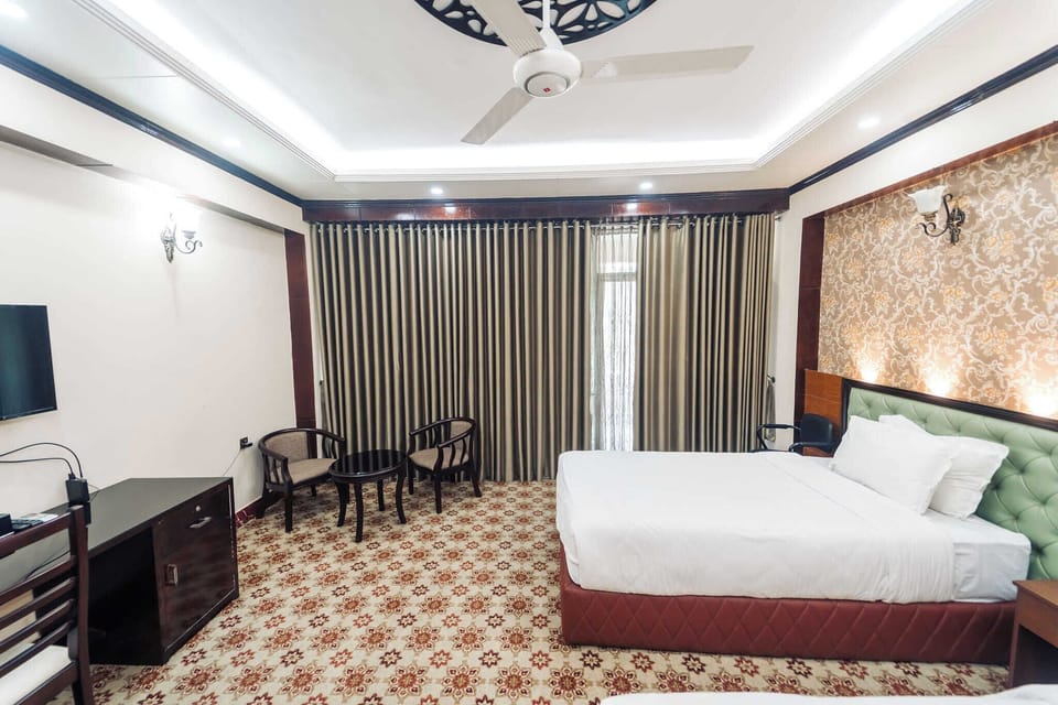 Deluxe Double Room, Garden View | Bathroom | Free toiletries, towels, soap, shampoo