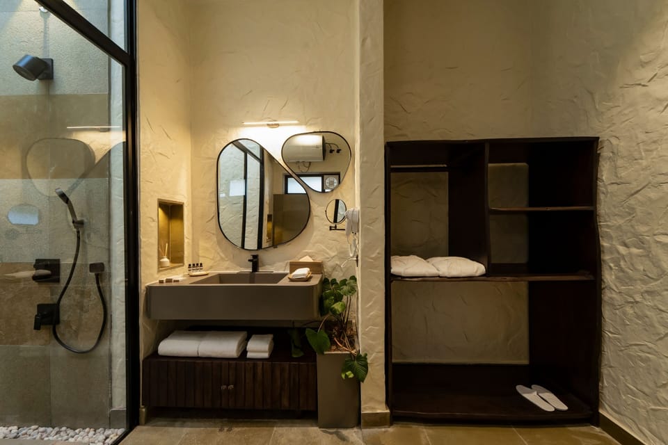 Luxury Cottage with Plunge Pool | Bathroom | Slippers, towels, soap, shampoo