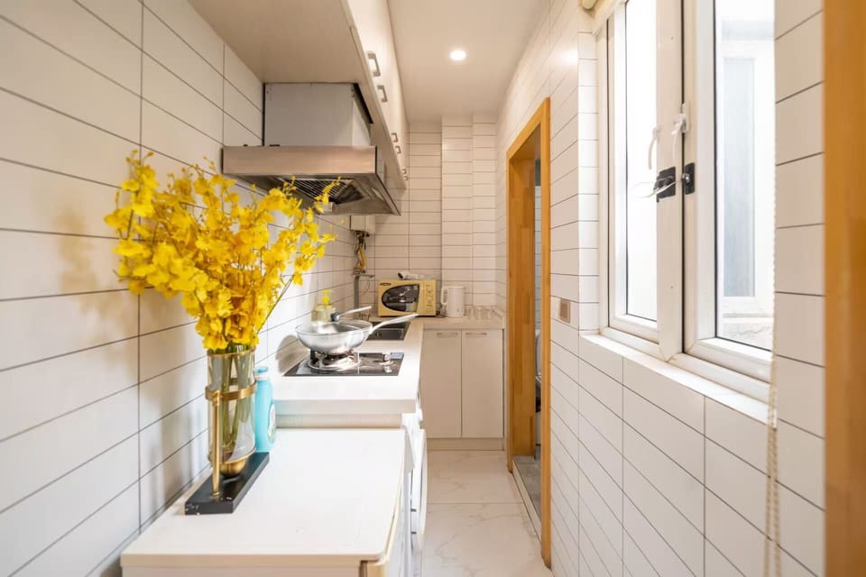 Senior Apartment | Private kitchen | Cleaning supplies, paper towels