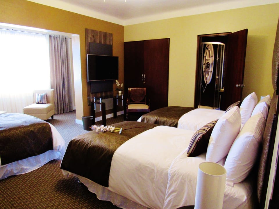 Premium bedding, down comforters, Select Comfort beds, minibar
