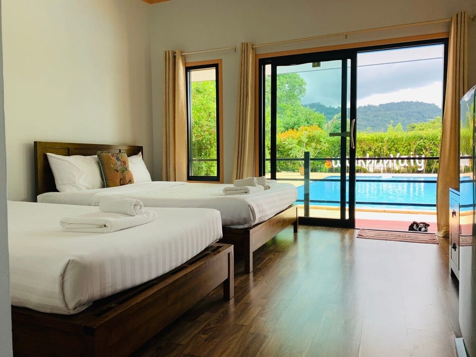 Family Room, Pool View | Desk, free WiFi