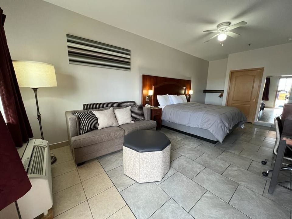 Deluxe Room, 1 King Bed with Sofa bed, Non Smoking | Desk, blackout drapes, iron/ironing board, bed sheets