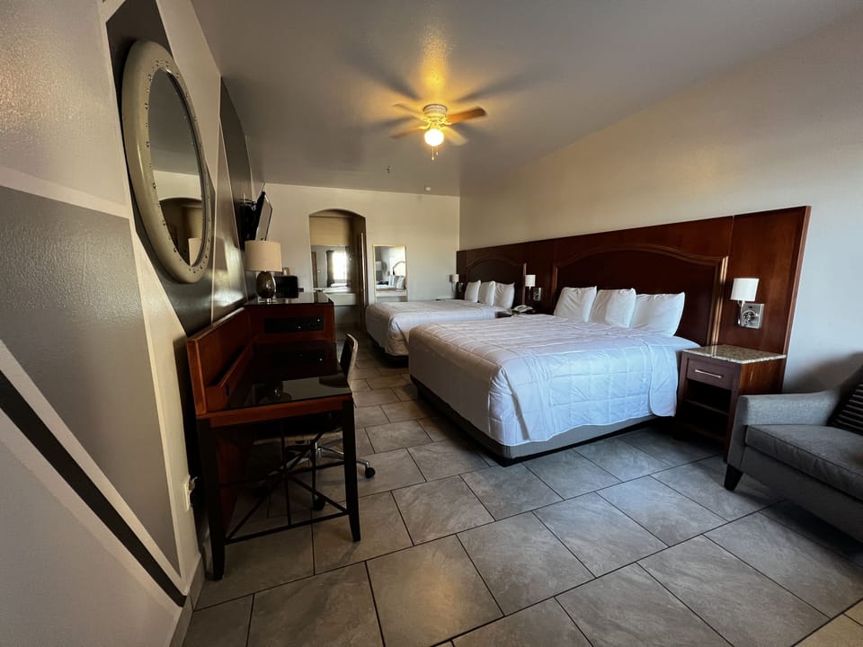 Standard Room with 2 Double Beds & a Sofa Sleeper | Desk, blackout drapes, iron/ironing board, bed sheets