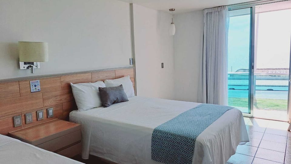Deluxe Double Room, Balcony, Sea View | Desk, laptop workspace, free WiFi