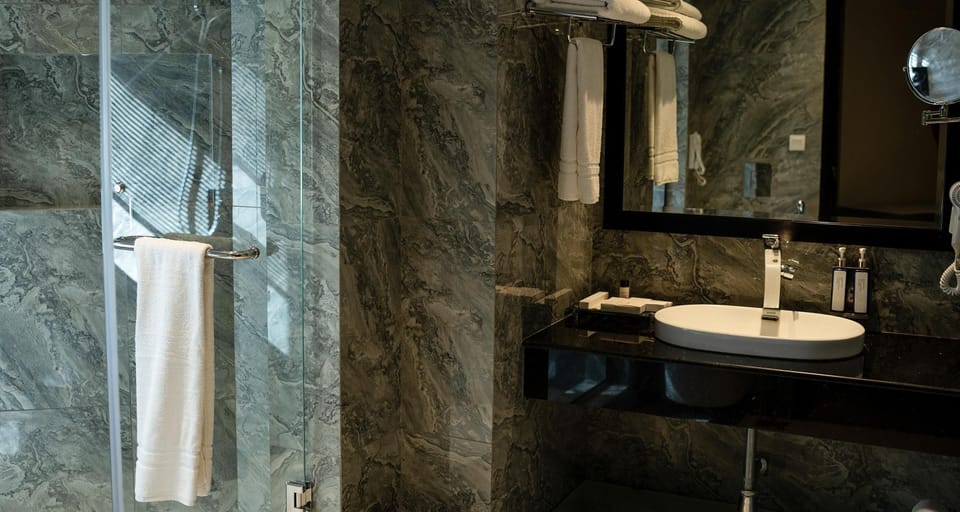 Deluxe Room, 1 Double Bed, Balcony, Mountain View | Bathroom | Hair dryer