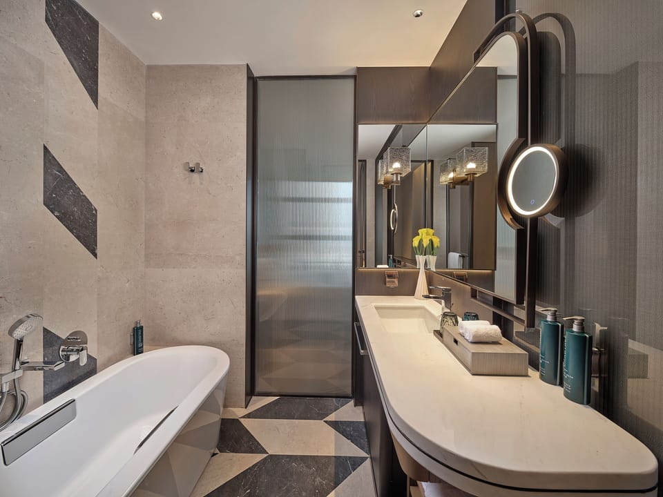 Rainfall showerhead, free toiletries, hair dryer, slippers