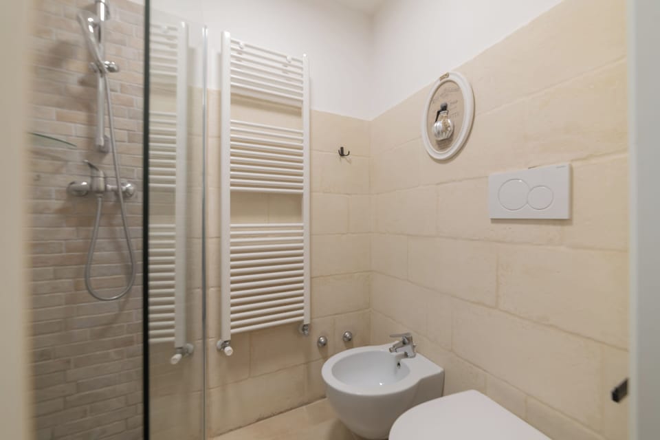 Family Apartment, 1 Bedroom | Bathroom | Shower, bidet, towels