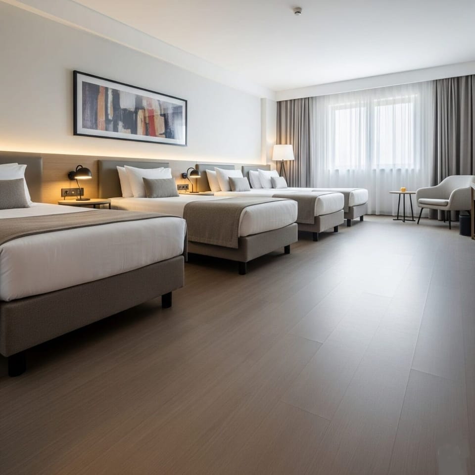 Quadruple Room, City View | Desk, laptop workspace, WiFi (free), bed sheets