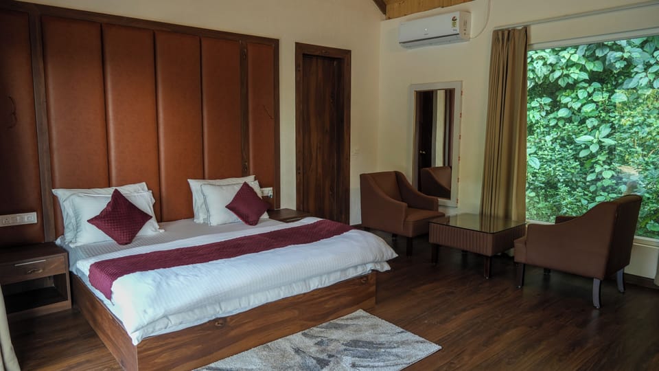 Deluxe Double Room, Garden View | Desk, laptop workspace, free WiFi