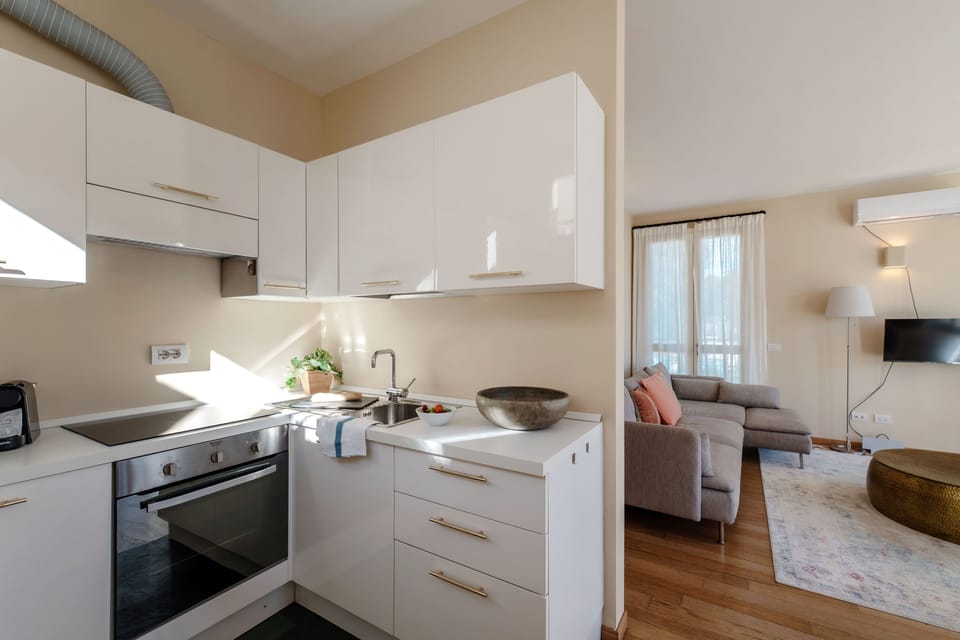 Apartment, Lake View | Private kitchen | Espresso maker, full-size fridge, oven, stovetop