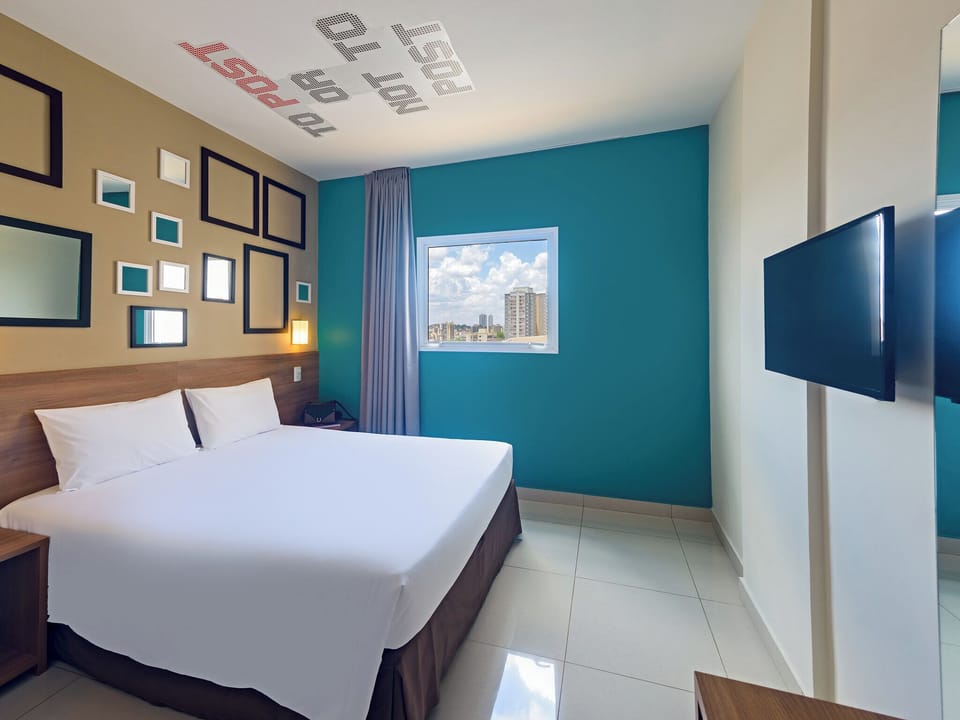 Standard Double Room | Minibar, desk, blackout drapes, free WiFi