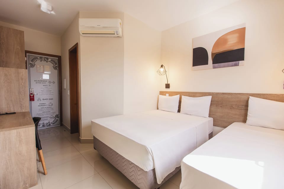 Family Triple Room | Minibar, desk, blackout drapes, soundproofing