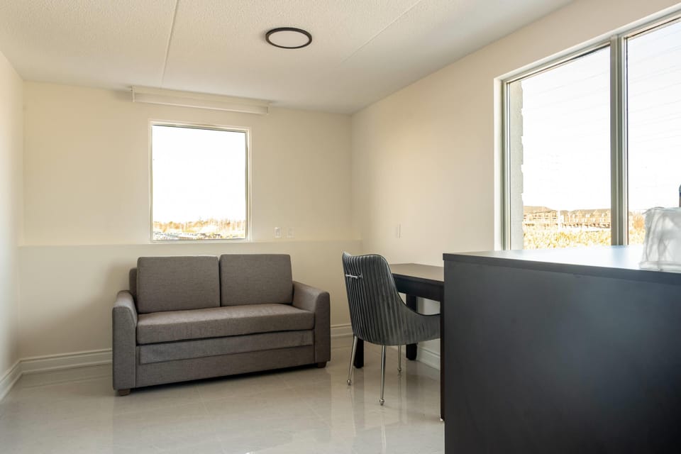 Suite, Multiple Beds, Non Smoking | Desk, blackout drapes, iron/ironing board, free WiFi