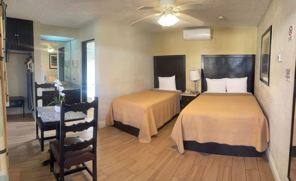 Classic Triple Room, Courtyard View | In-room safe, blackout drapes, iron/ironing board, free WiFi