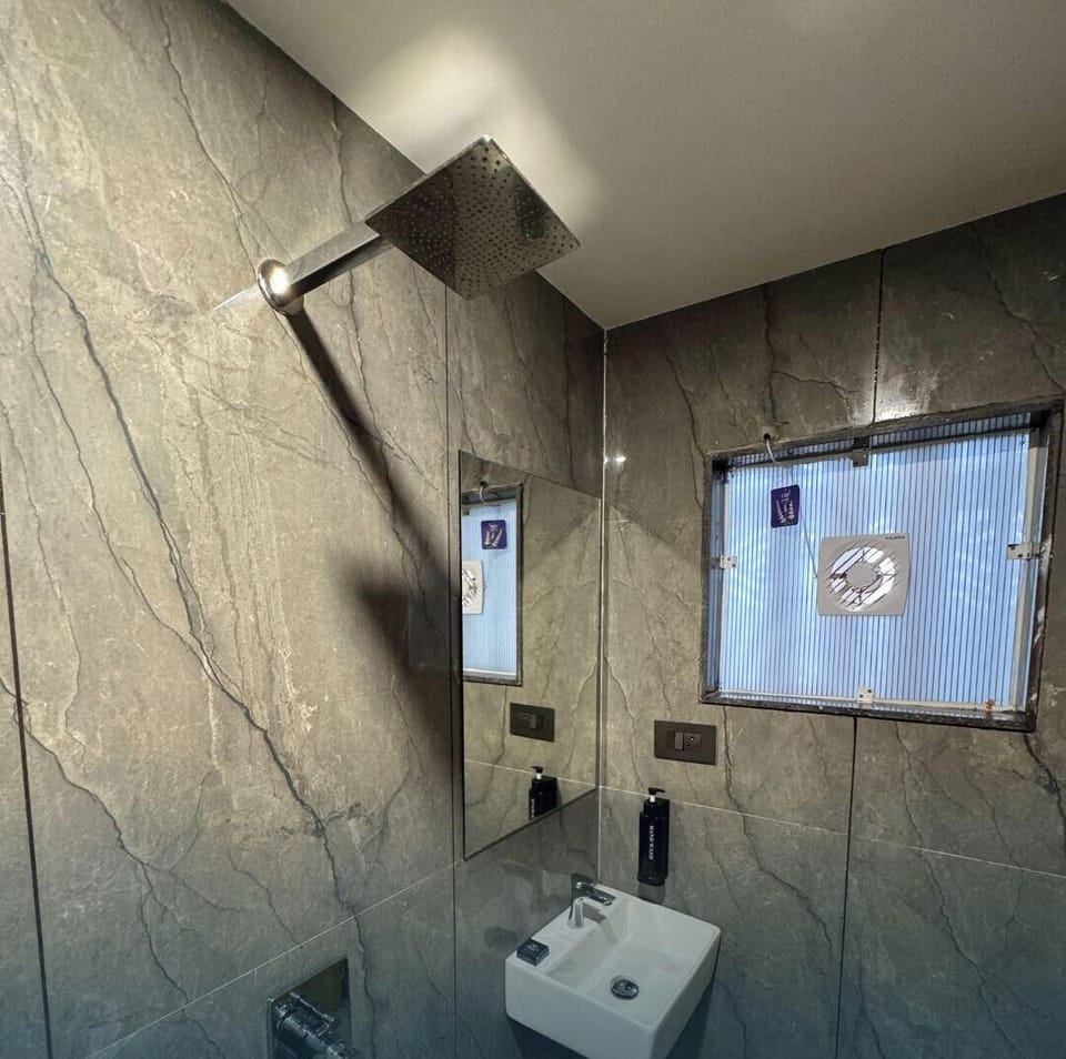 Shower, towels, soap, shampoo