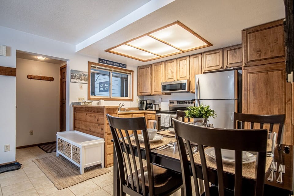 Condo, Multiple Beds, Patio, Mountain View (Bluff Condo 4119) | Private kitchen | Dining tables
