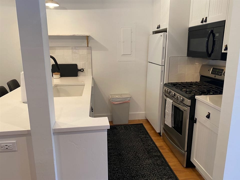 Condo, Multiple Beds, Patio, Mountain View (Andora Villa 123) | Private kitchen | Dining tables