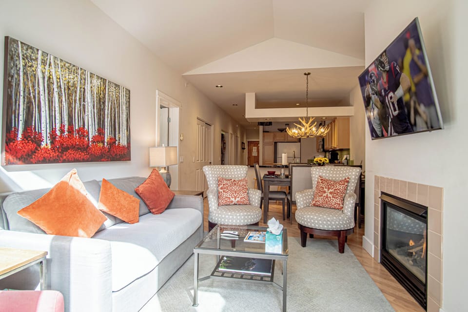 Condo, Multiple Beds, Patio, Mountain View (Snow Star Condo 24) | Living area | 42-inch flat-screen TV with digital channels