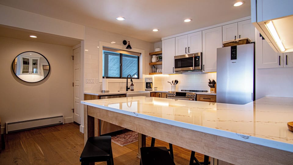 Condo, Multiple Beds, Patio, Mountain View (Bluff Condo 4138) | Private kitchen | Dining tables