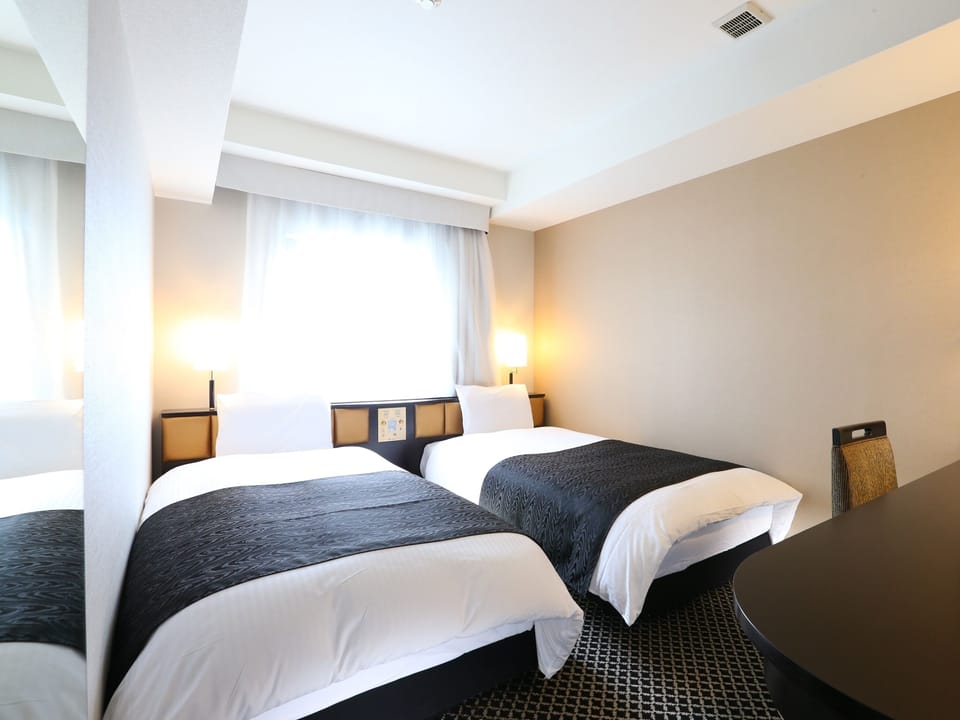 Down comforters, desk, free WiFi, bed sheets