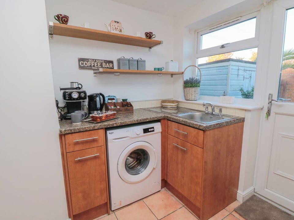 Fridge, microwave, toaster, cookware/dishes/utensils