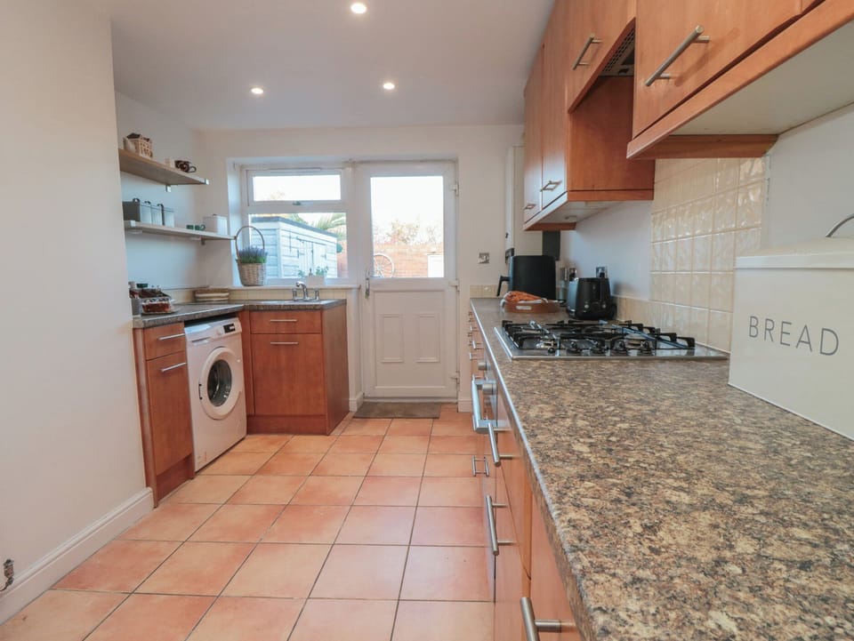 Fridge, microwave, toaster, cookware/dishes/utensils