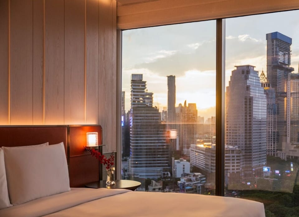 Room, 1 King Bed, Park View | Free minibar items, in-room safe, desk, laptop workspace