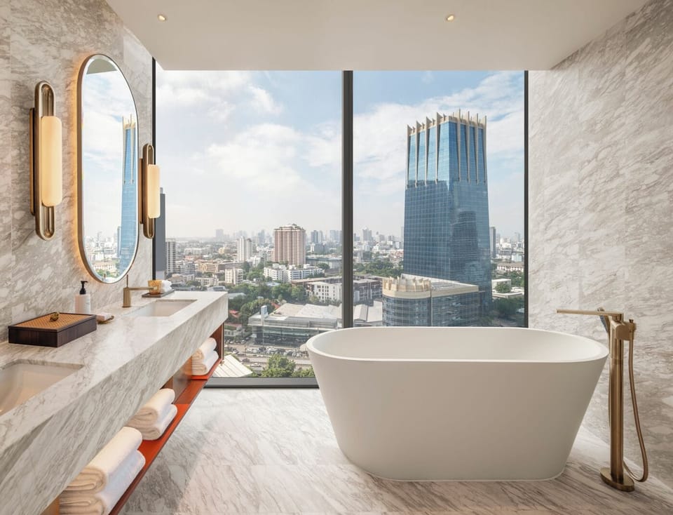 Designer toiletries, hair dryer, bathrobes, slippers