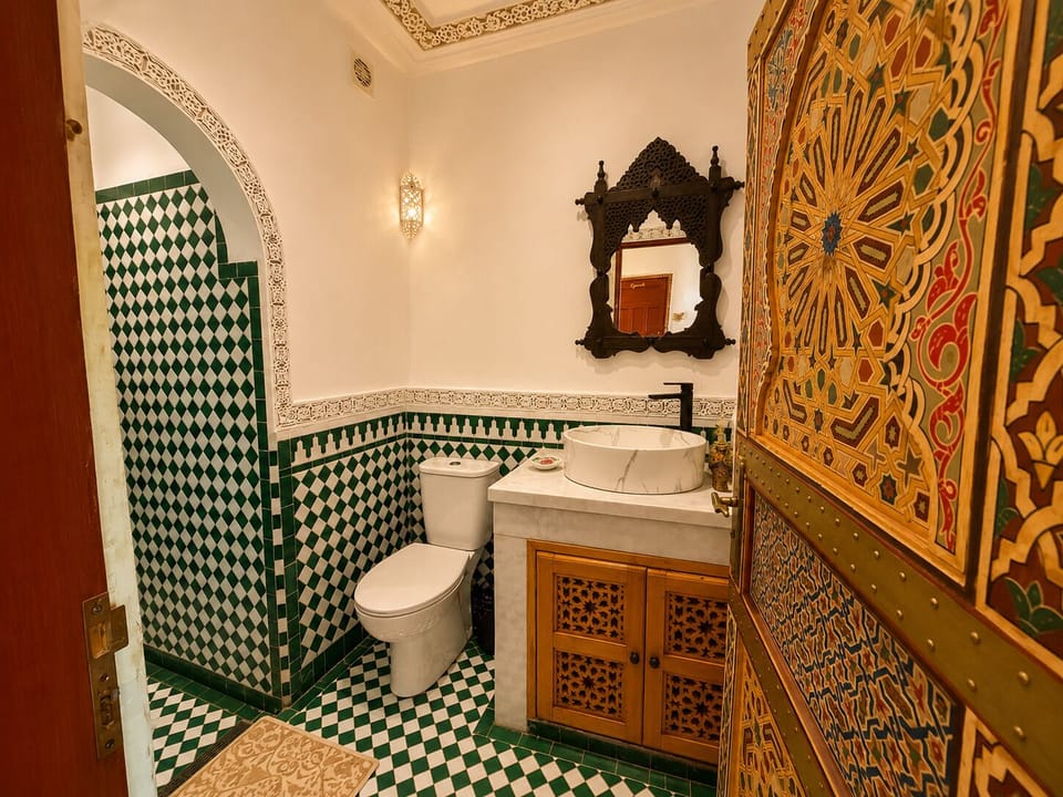 Family Quadruple Room | Bathroom | Shower, bathrobes, towels, soap
