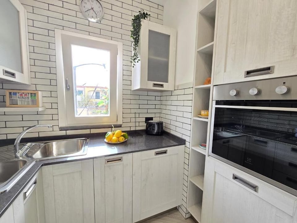 Luxury Duplex, City View | Private kitchen | Fridge, microwave, oven, stovetop