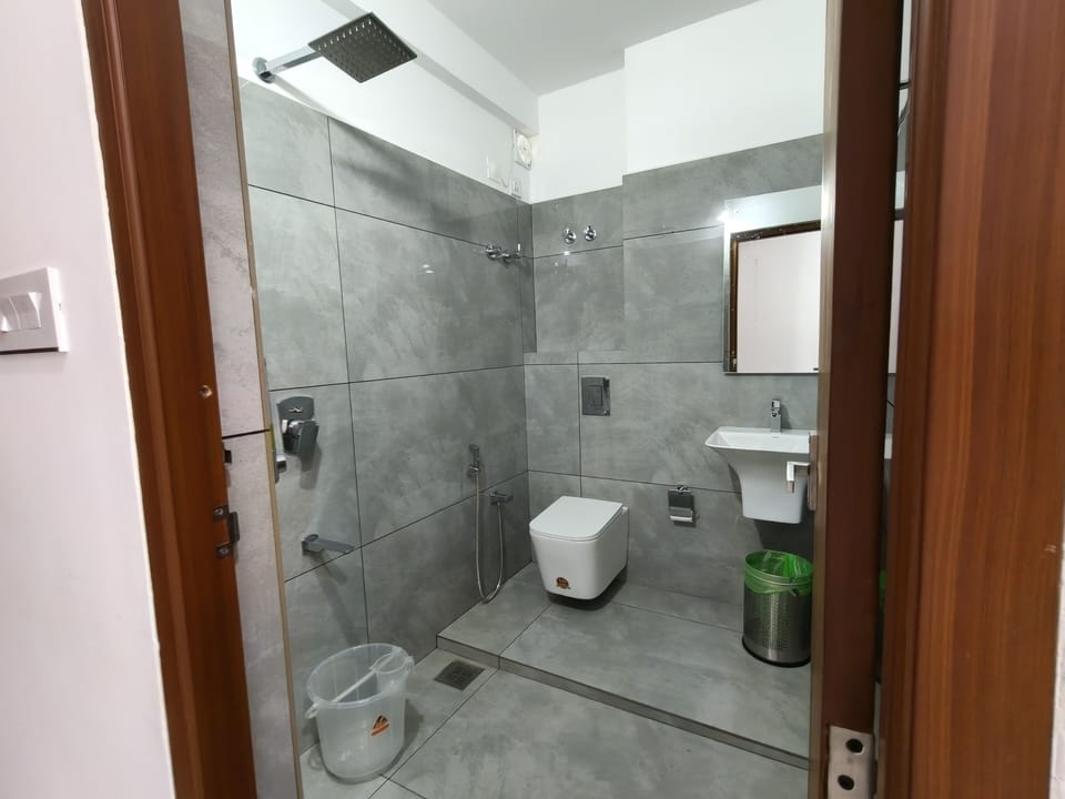 Shower, slippers, towels, soap