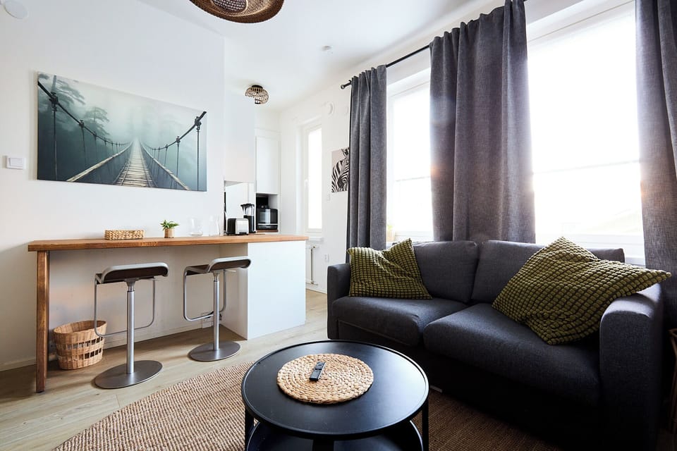 Apartment, City View | Living area | Flat-screen TV