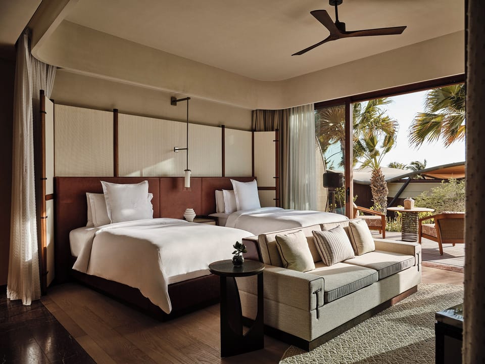Hypo-allergenic bedding available, down comforters, minibar