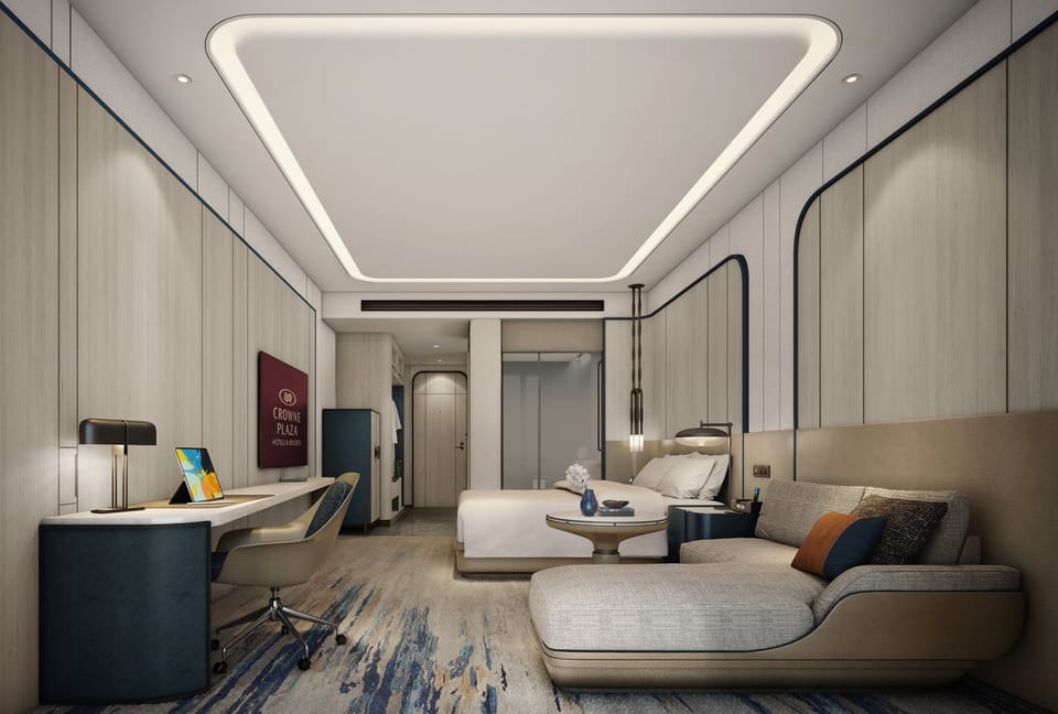 Premium bedding, desk, laptop workspace, soundproofing