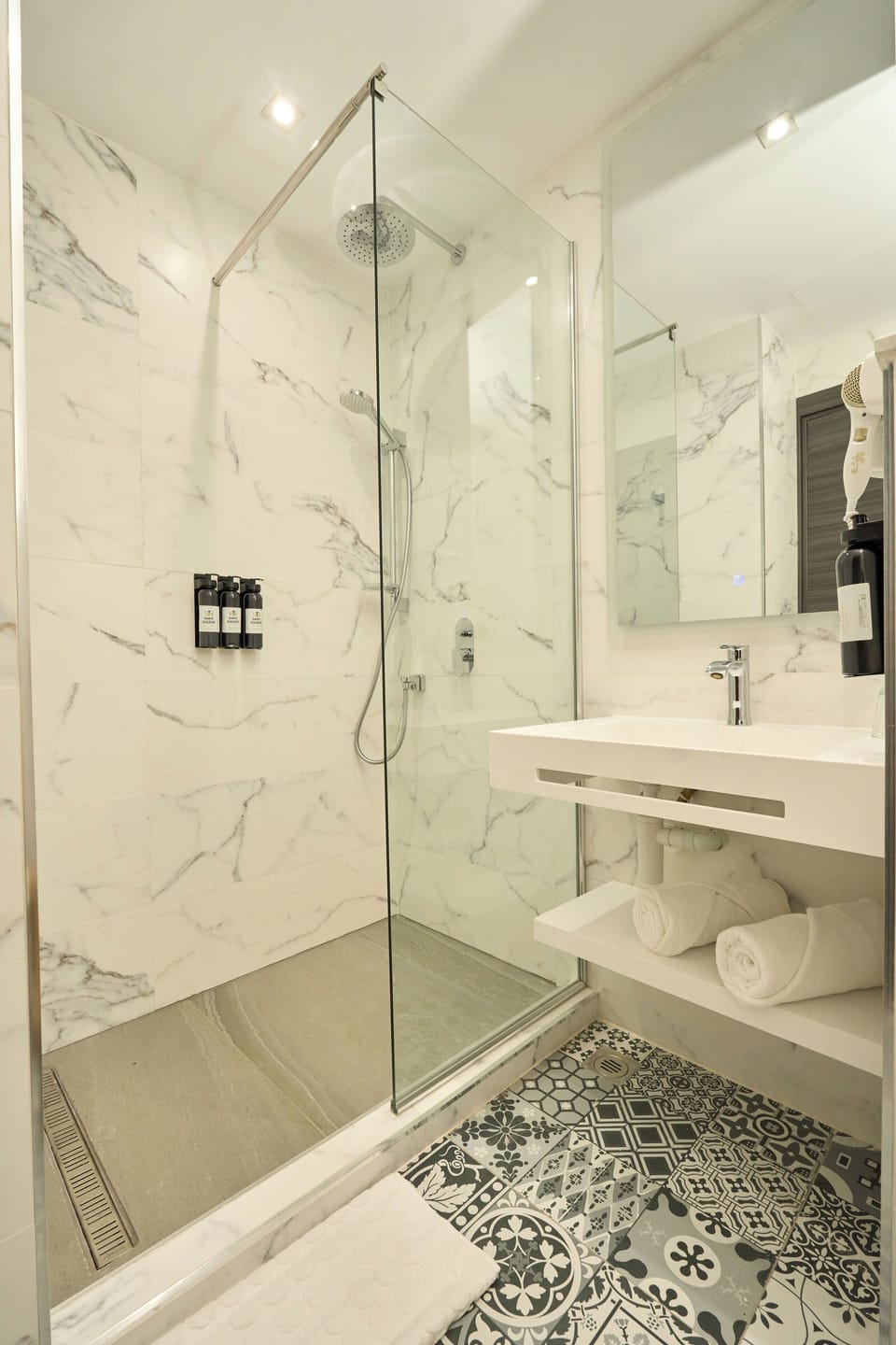 Hair dryer, towels, soap, shampoo