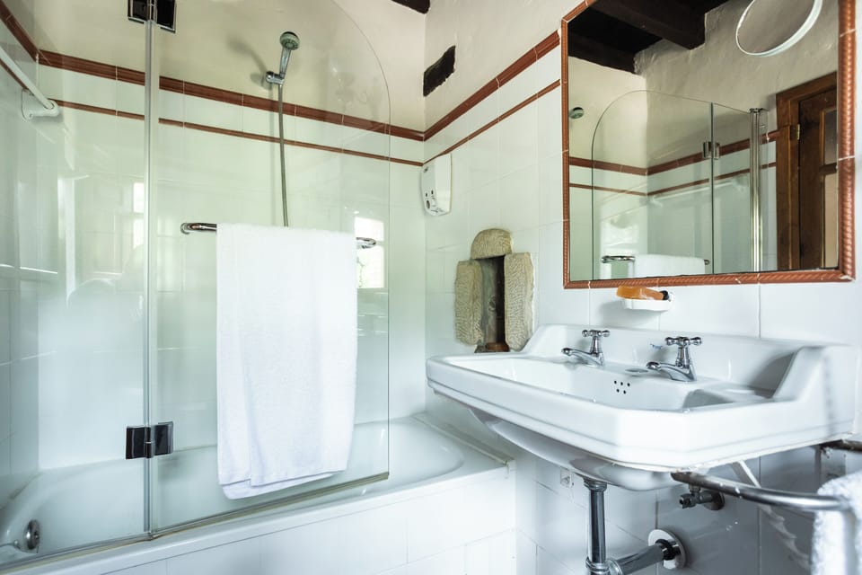 Luxury Double or Twin Room | Bathroom | Designer toiletries, hair dryer, bathrobes, slippers
