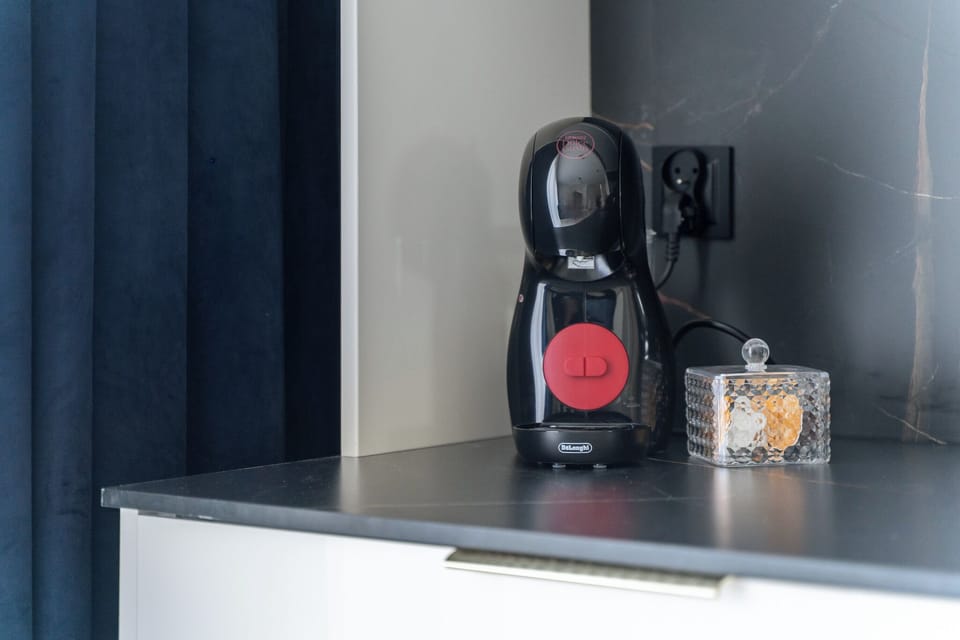 Classic Apartment, Balcony | Coffee and/or coffee maker