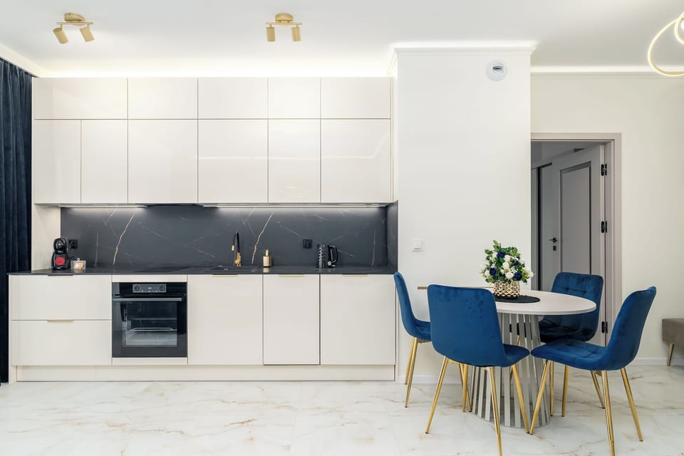 Classic Apartment, Balcony | Living area | Flat-screen TV