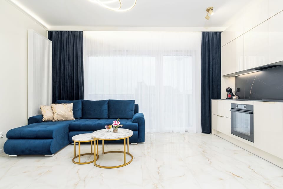 Classic Apartment, Balcony | Living area | Flat-screen TV