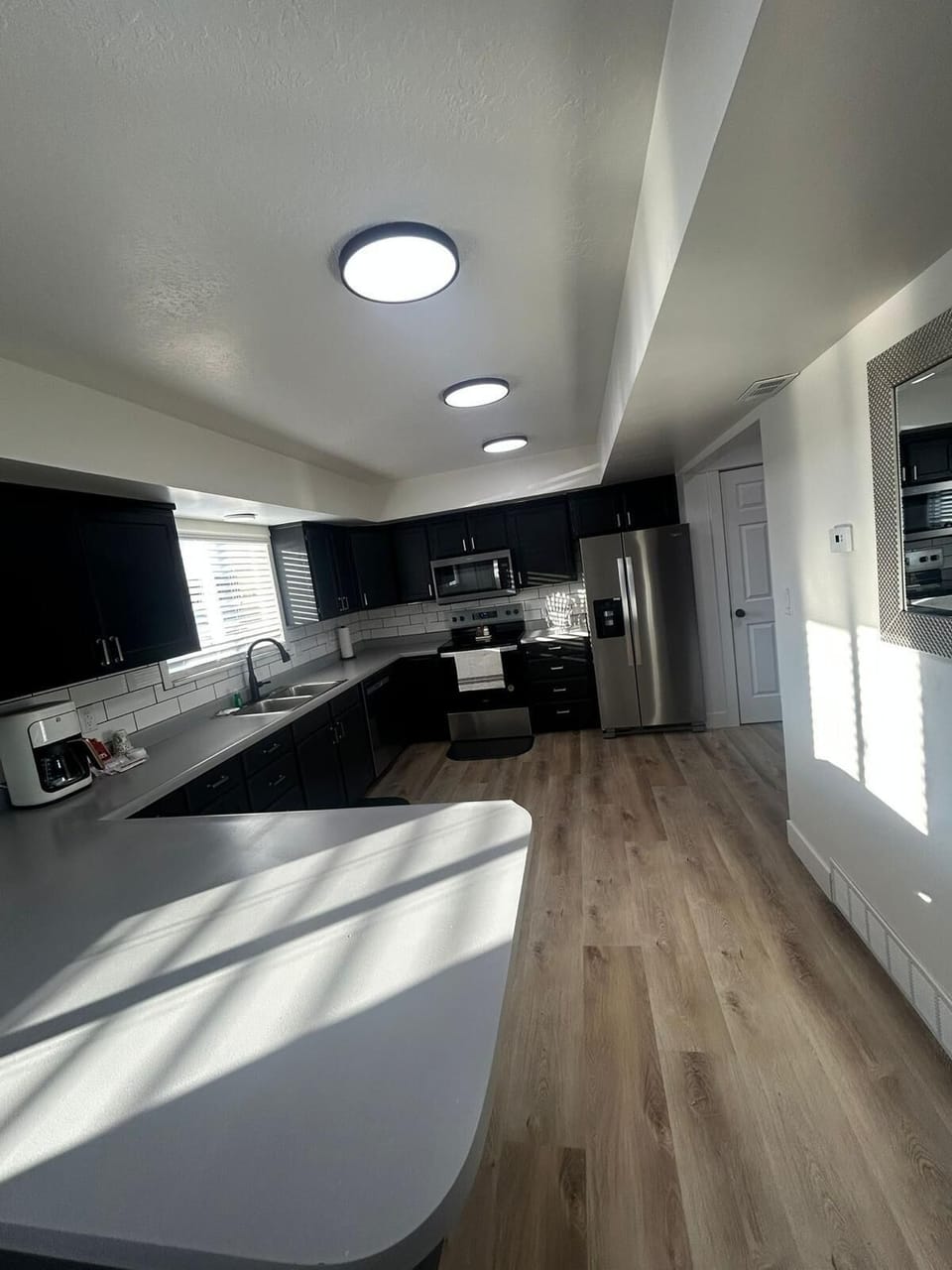 Family Townhome | Private kitchen | Full-size fridge, microwave, coffee/tea maker, toaster