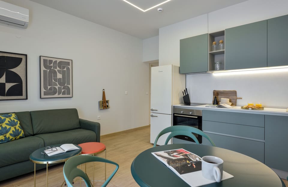 Superior Apartment Suite, Sea View | Living area | Printers