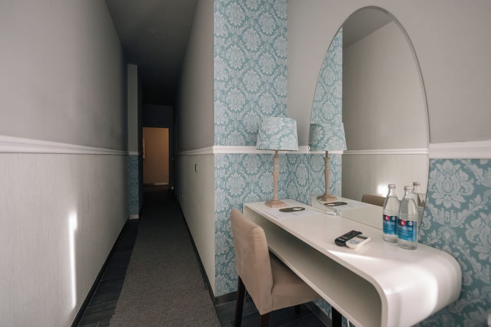 Economy Double Room, Courtyard View | Minibar, free WiFi, bed sheets
