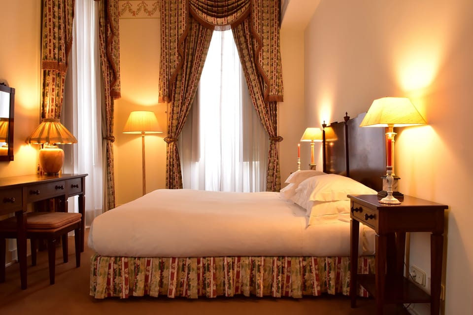 Standard Double or Twin Room | Minibar, in-room safe, desk, blackout drapes
