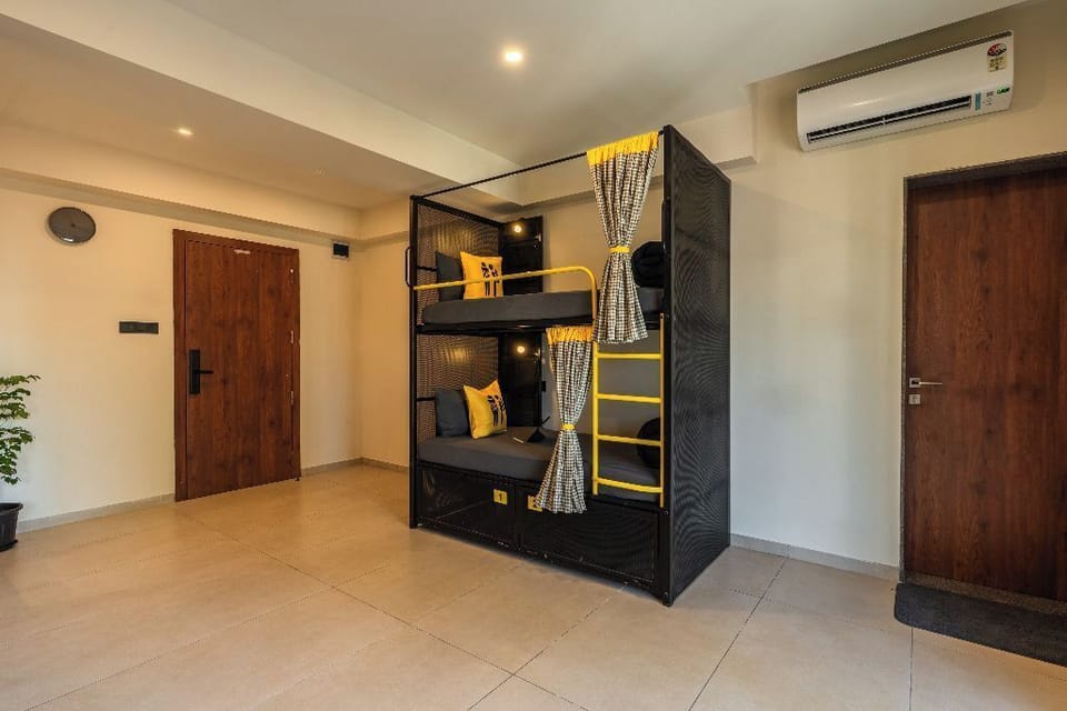Bed in 4 Bed Female Dormitory with Balcony and City View | Iron/ironing board, free WiFi, bed sheets