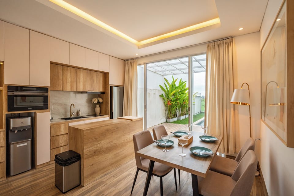 Deluxe Villa, Pool View | Private kitchen | Fridge, microwave, stovetop, cookware/dishes/utensils
