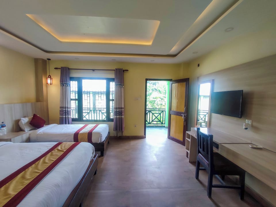 Deluxe Double or Twin Room, Garden View | Desk, laptop workspace, iron/ironing board, free WiFi